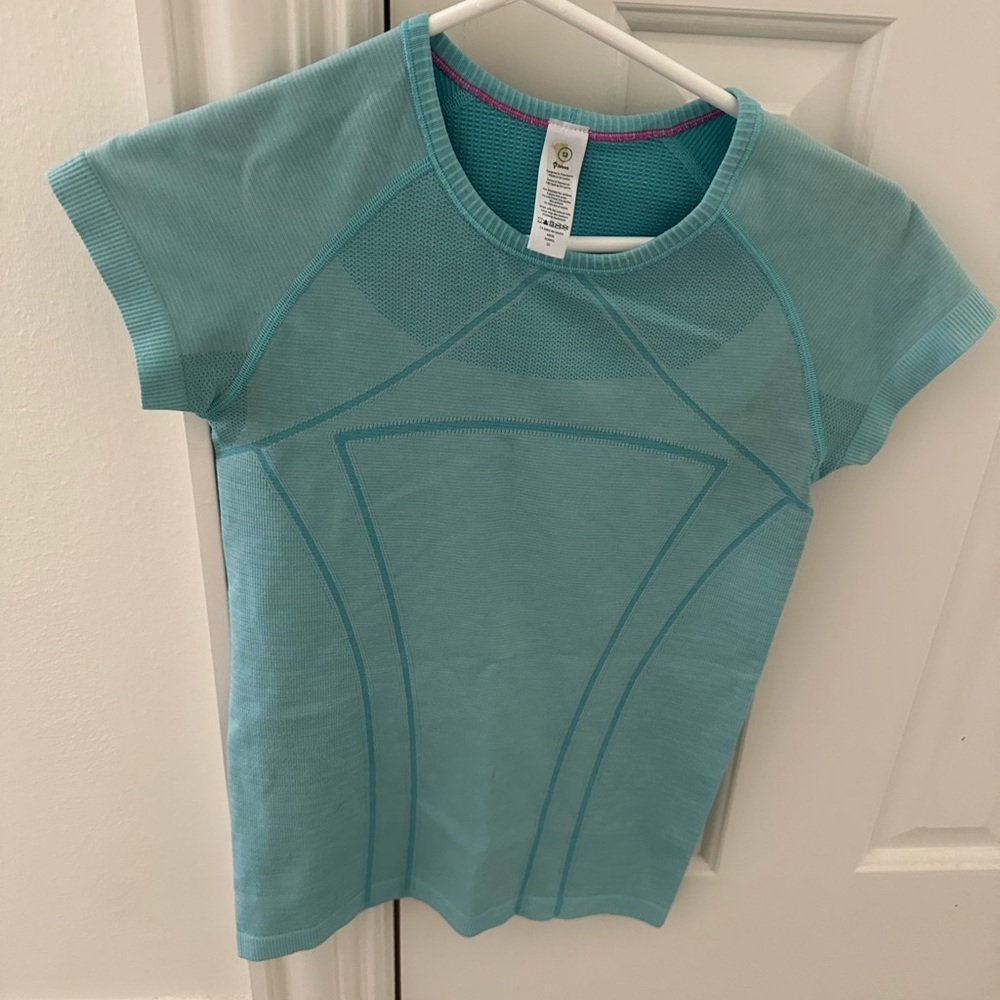 Light Blue ivivva short sleeve swiftly tech.